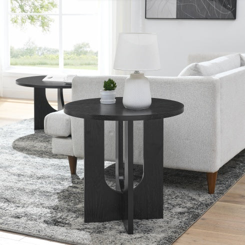 Shopi Vella modern solid wood coffee table with round black finish in bright living room setting