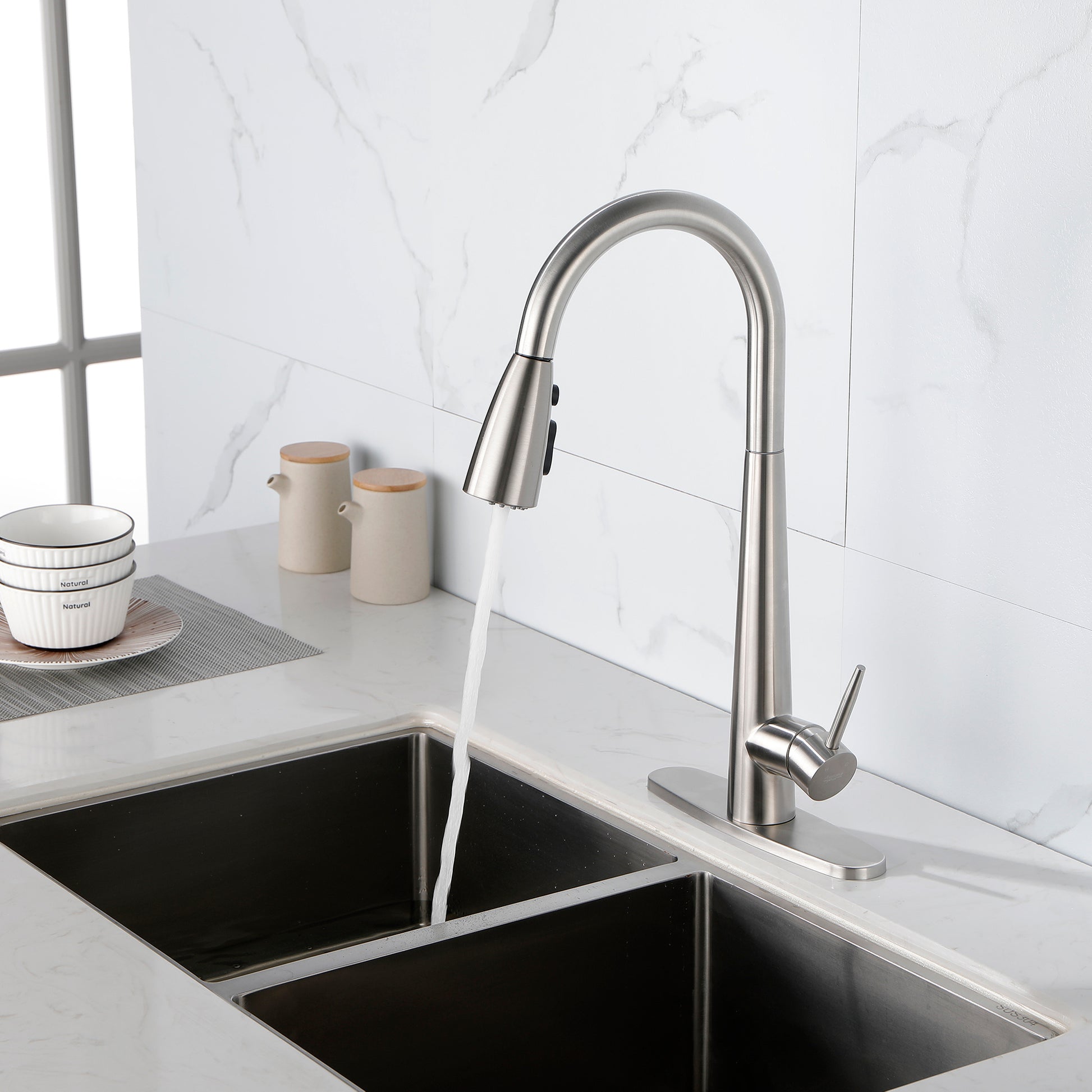 Shopi Vella modern stainless steel kitchen faucet with pull-down sprayer over double sink