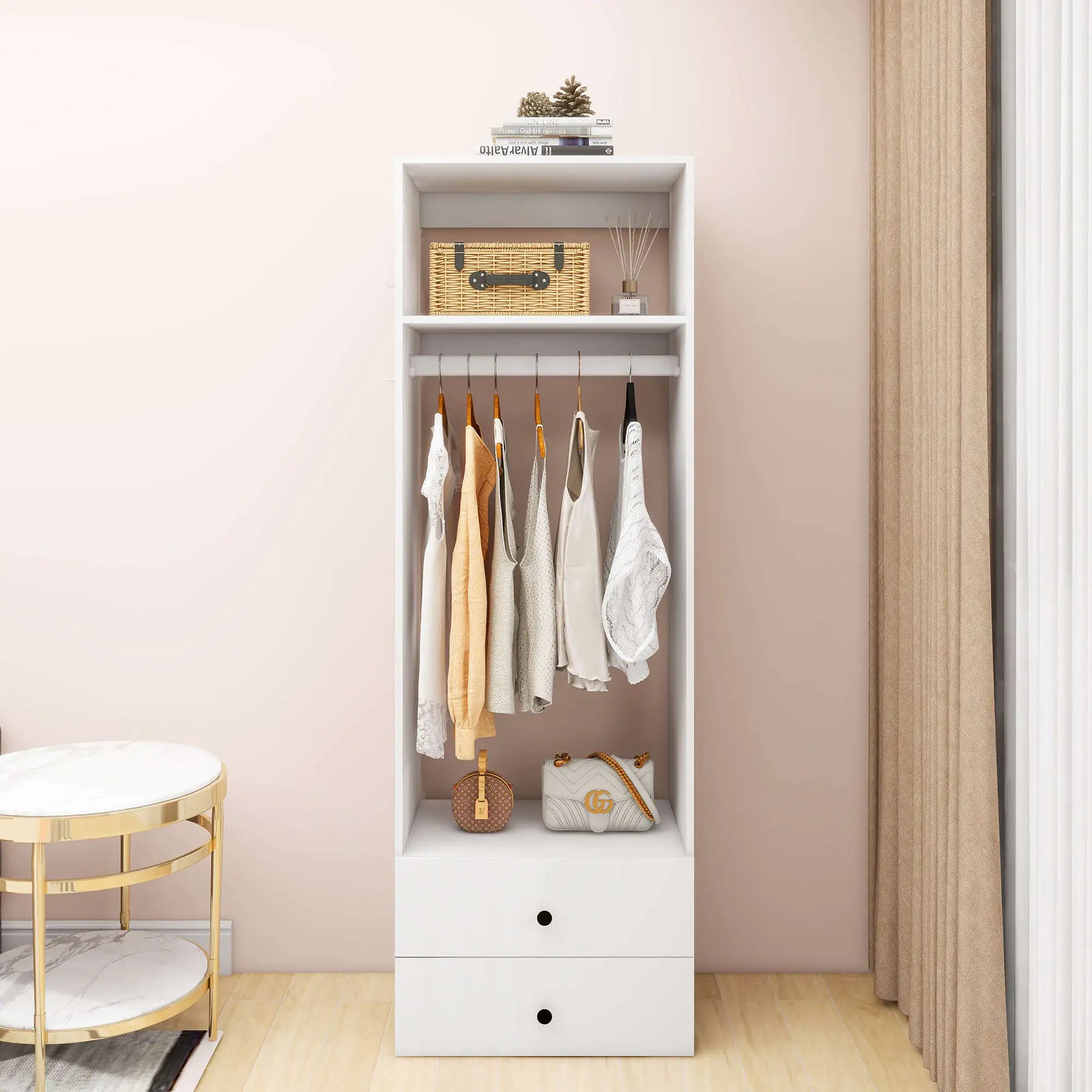 White modular wooden closet organizer system with hanging clothes, drawers, and storage shelves
