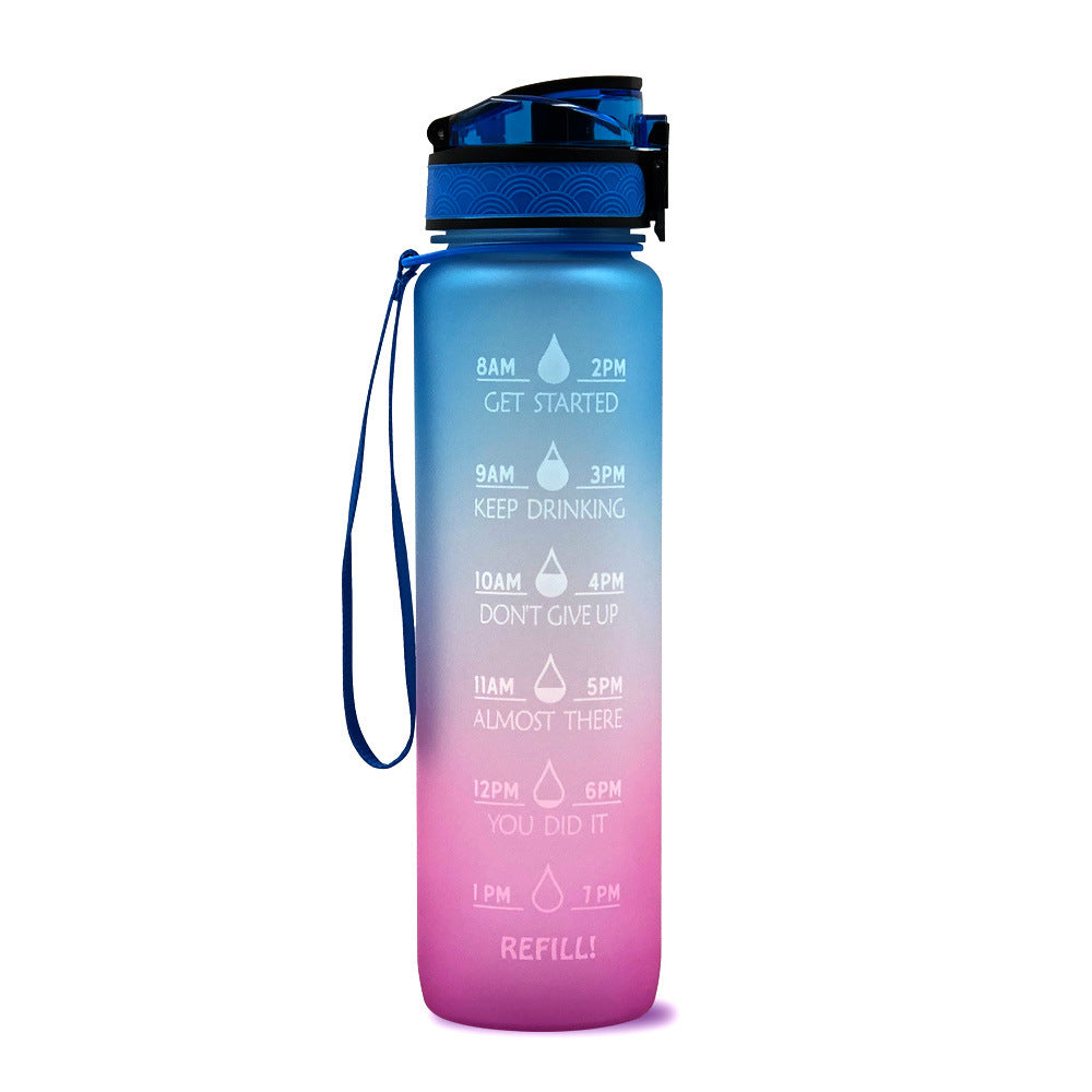 Shopi Vella motivational water bottle with time marker in blue and pink gradient for tracking hydration