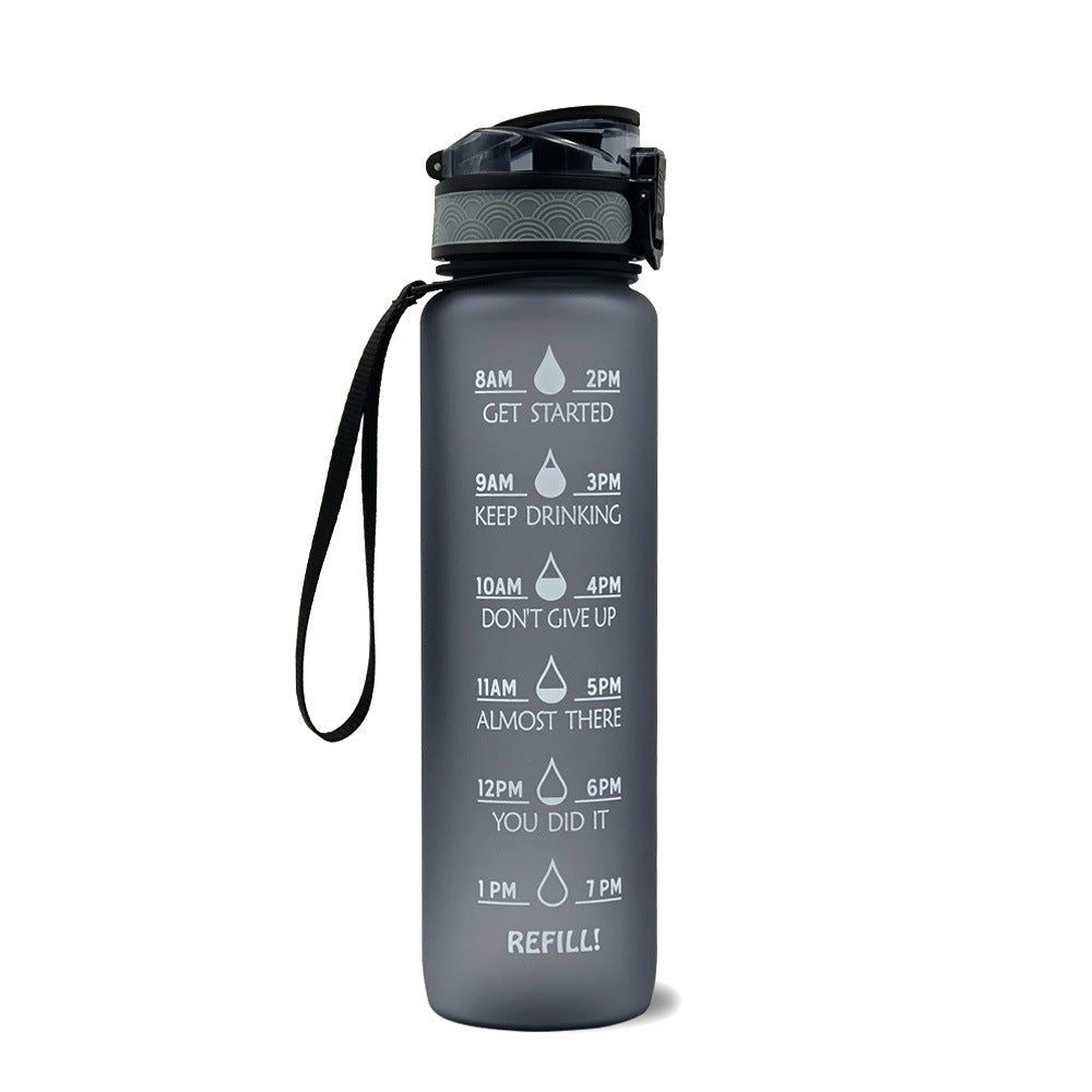 Shopi Vella motivational water bottle with time marker in gray with flip-top lid and carry strap