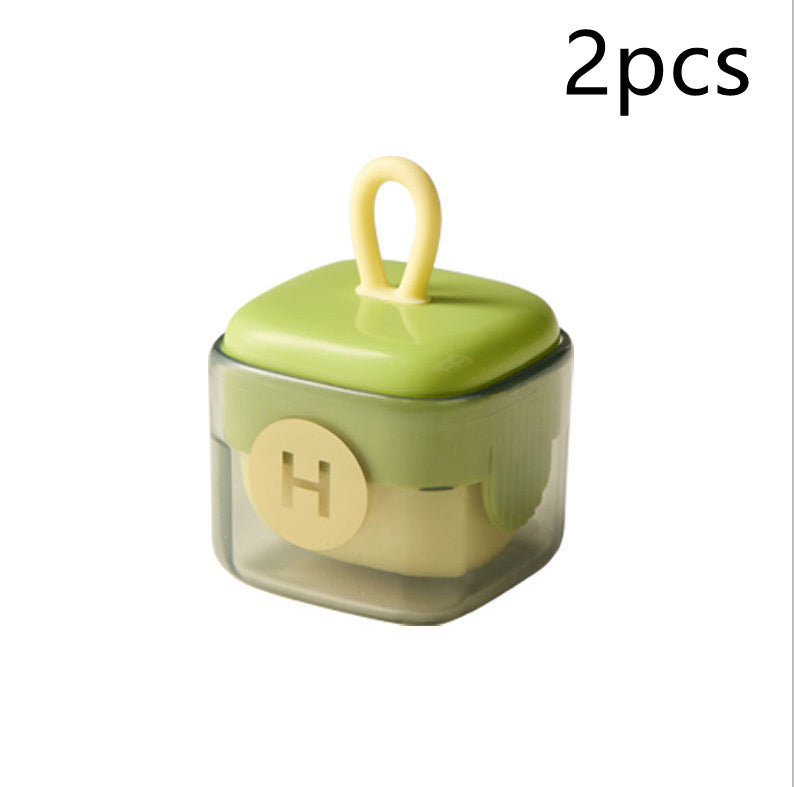Shopi Vella multi-functional cleaning roller in compact green and beige storage case for kitchen use