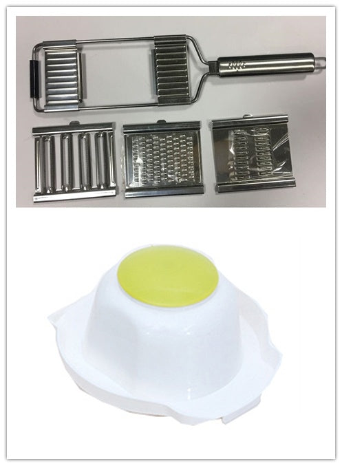Shopi Vella multi-purpose grater and peeler with interchangeable stainless steel blades and white food holder