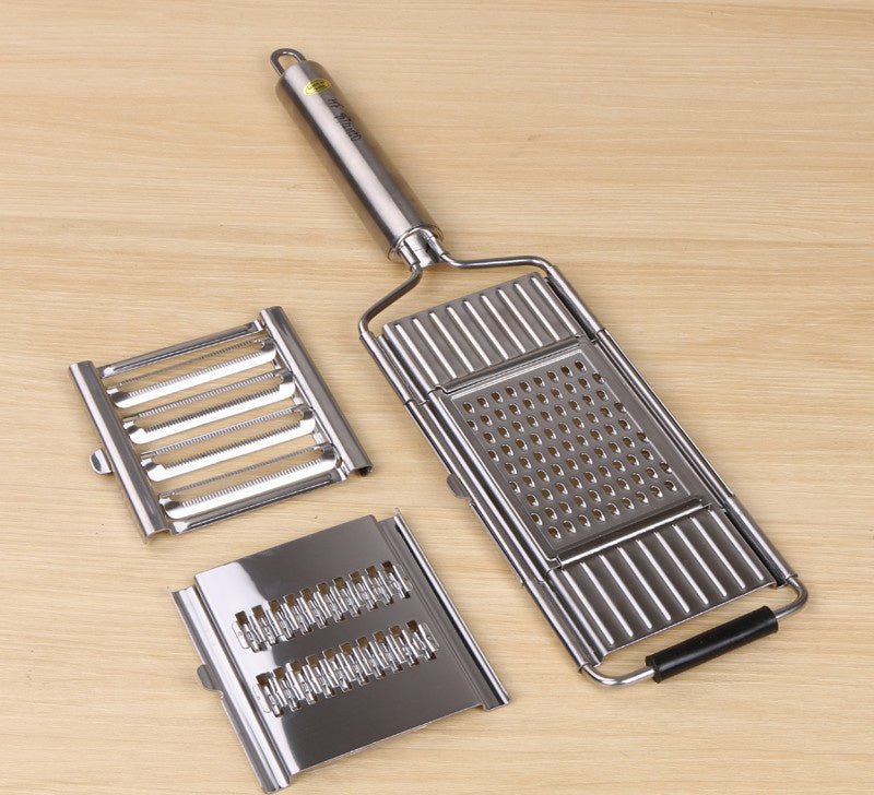 Shopi Vella multi-purpose grater and peeler with stainless steel handle and three interchangeable grating blades