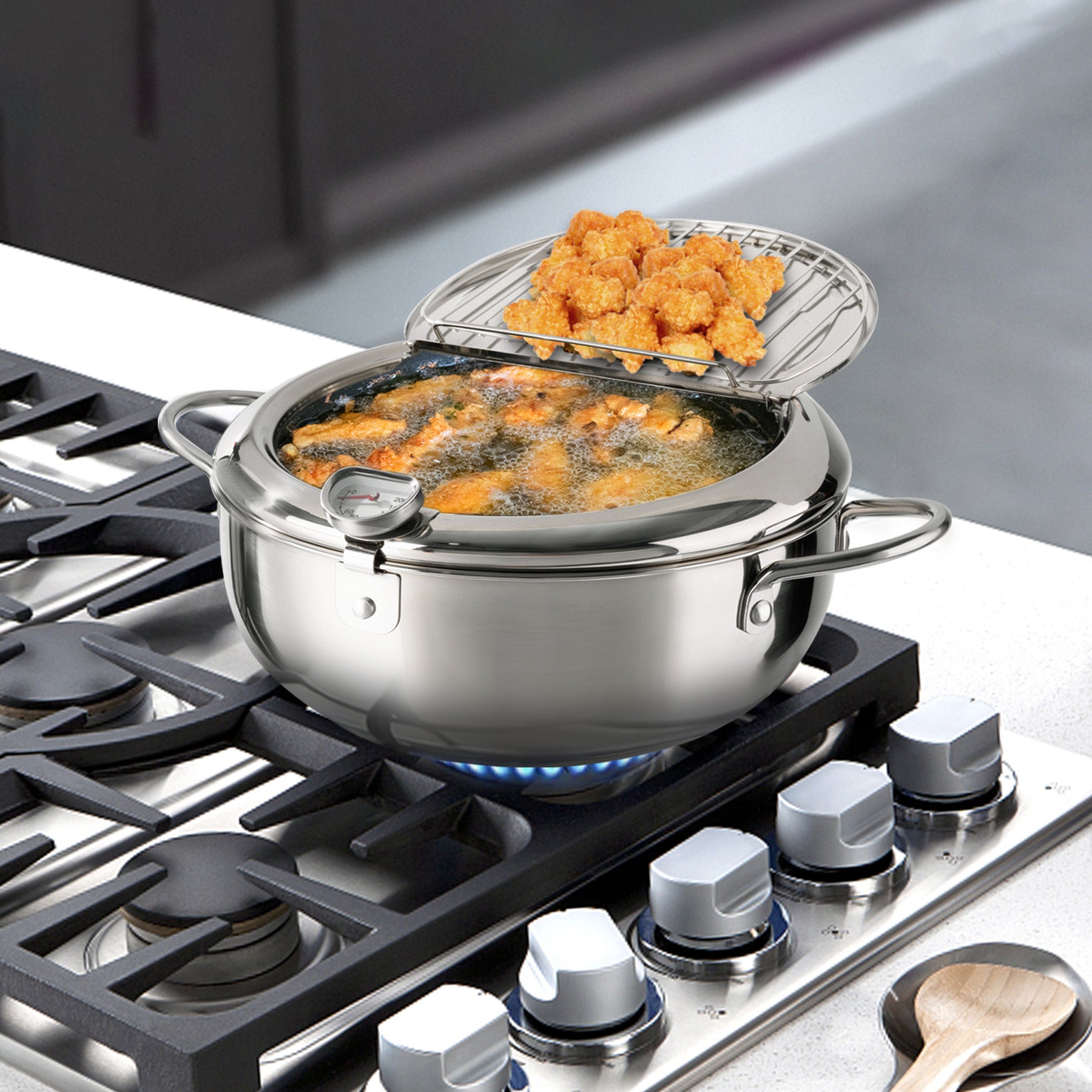Shopi Vella multi-purpose kitchen storage pot frying golden crispy food on a gas stove