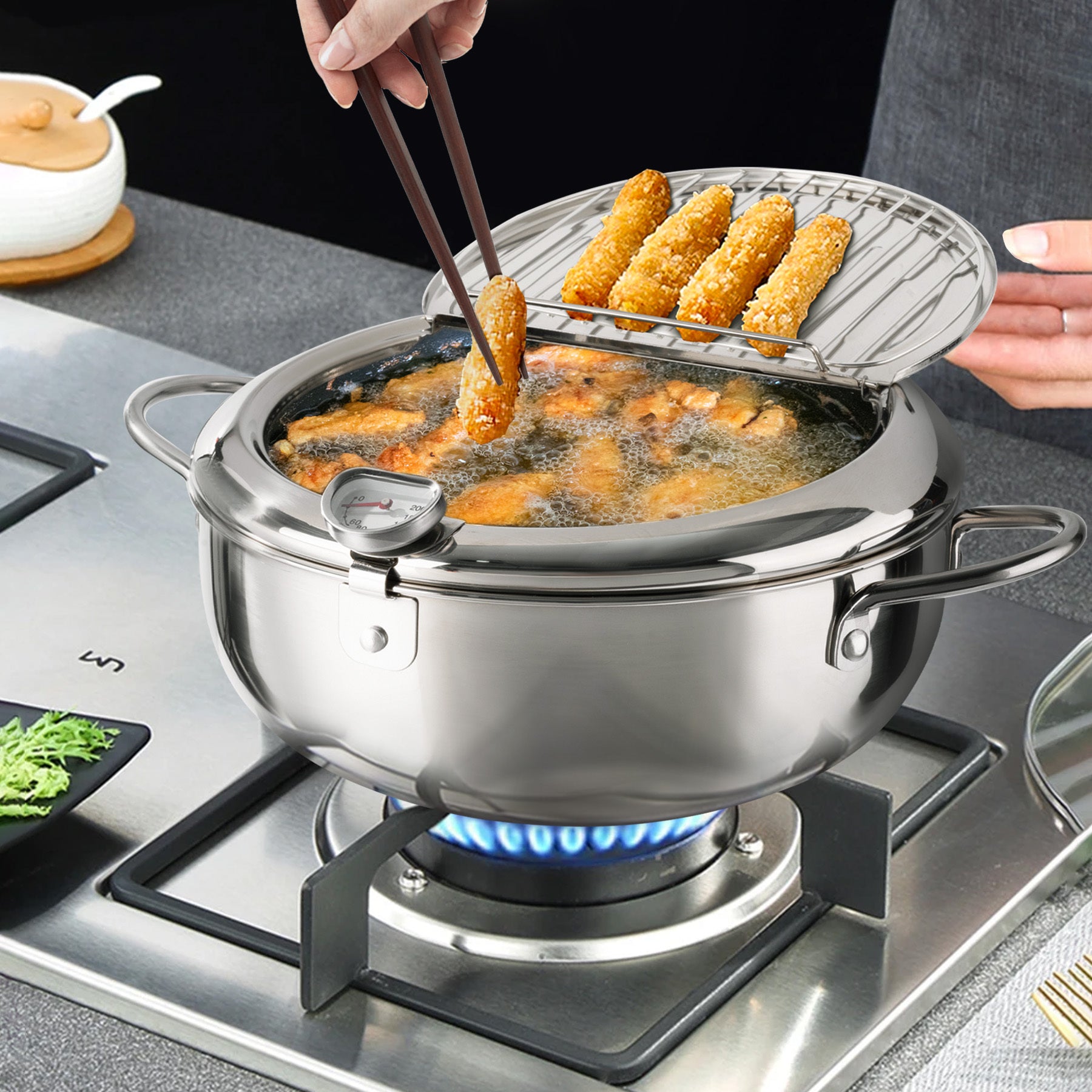 Shopi Vella multi-purpose kitchen storage pot frying golden crispy snacks with built-in strainer on stove