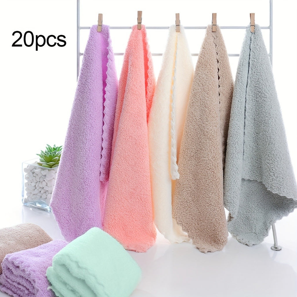 Shopi Vella 20pcs solid color travel towels in pastel shades hanging and folded on white surface