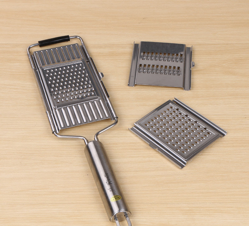 Shopi Vella multifunctional food safety rack with stainless steel grater and interchangeable blades for cooking tools