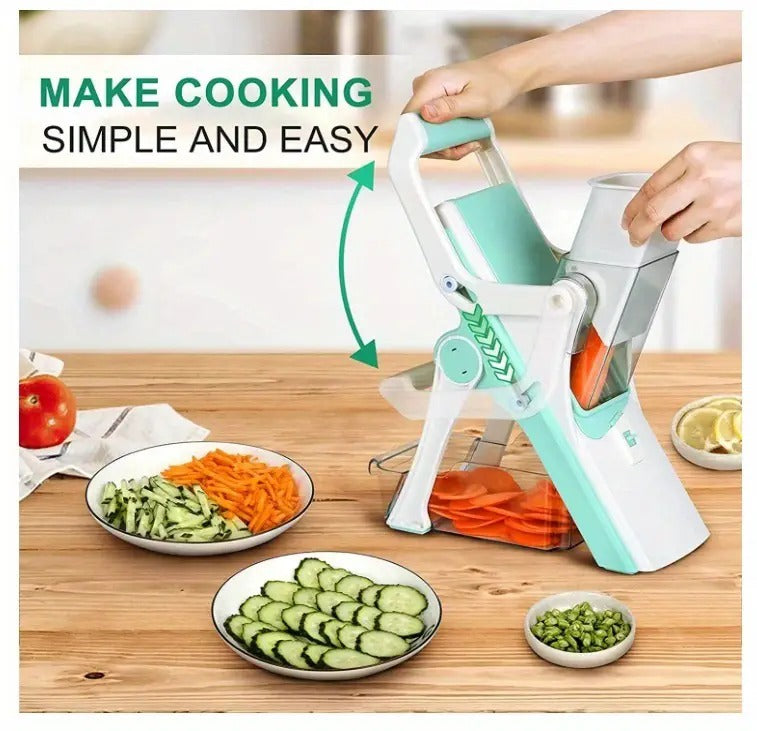 Shopi Vella multifunctional mushroom vegetable slicer in use slicing carrots and cucumbers on wooden table