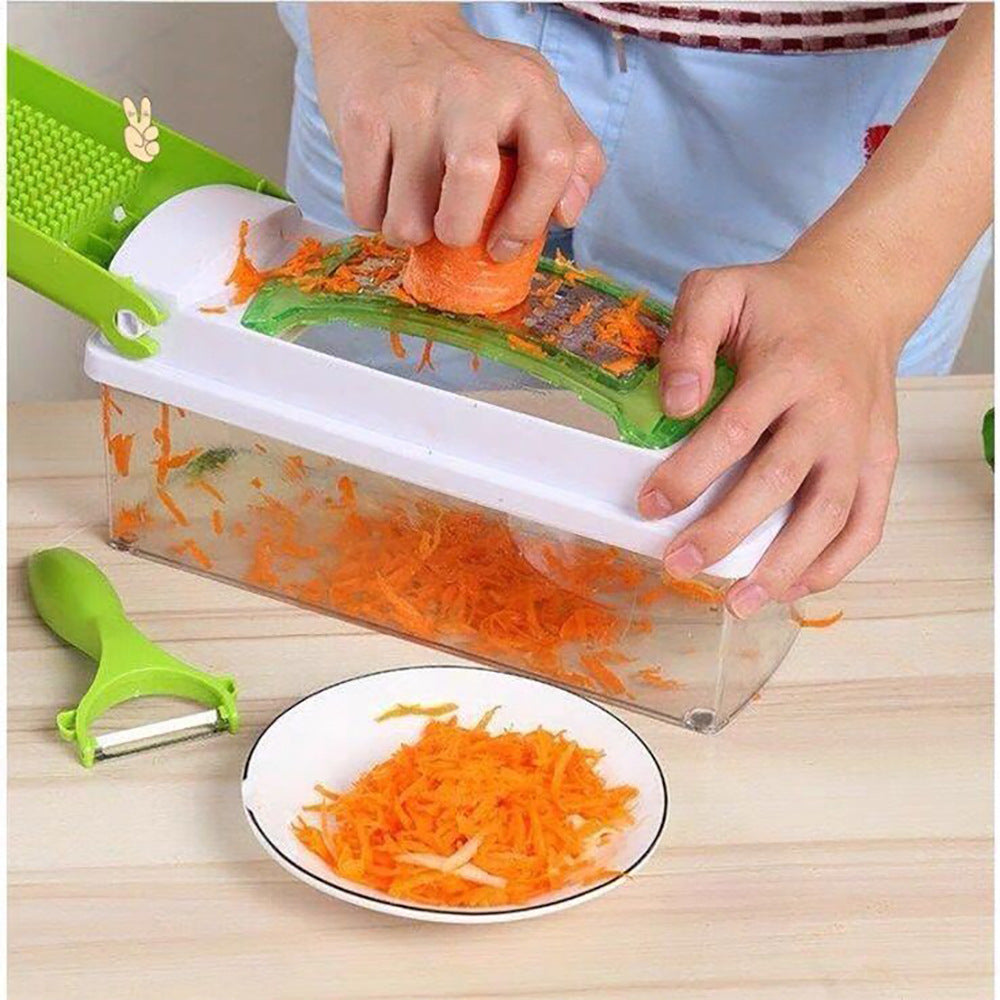 Shopi Vella multifunctional vegetable chopper grating carrots into a container with a green peeler on the table