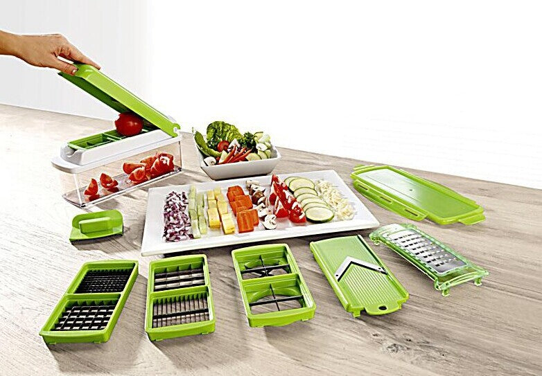 Shopi Vella multifunctional vegetable chopper with multiple green interchangeable blades and fresh chopped vegetables