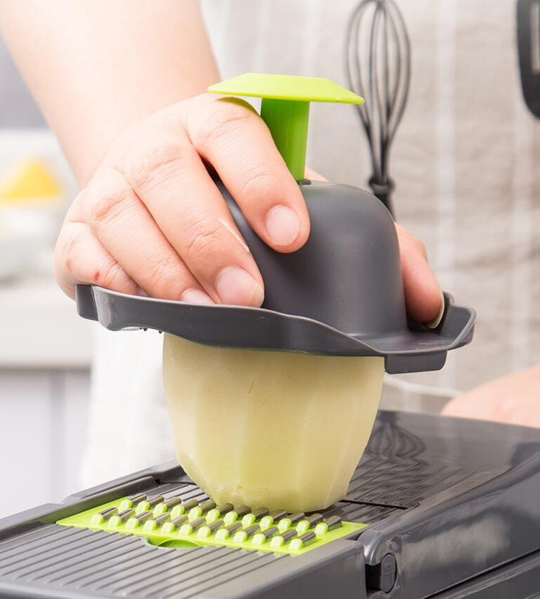 Shopi Vella multifunctional vegetable cutter for kitchen slicing a peeled potato with hand guard