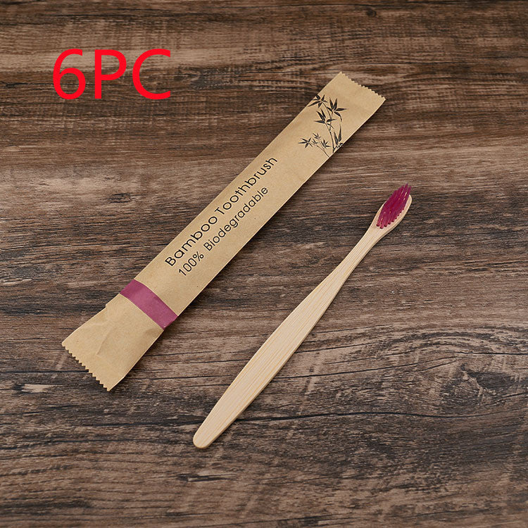 Shopi Vella natural bamboo toothbrushes soft bristle with biodegradable packaging on wooden background
