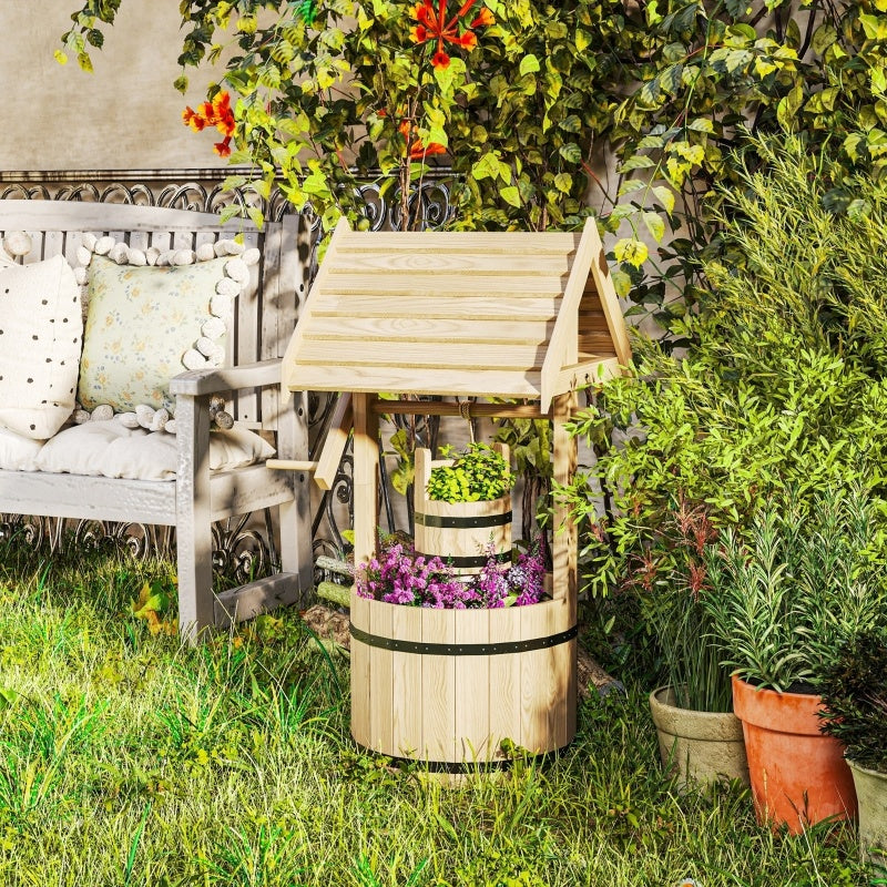 Natural wood garden planter with drain hole displayed outdoors surrounded by greenery and flowers