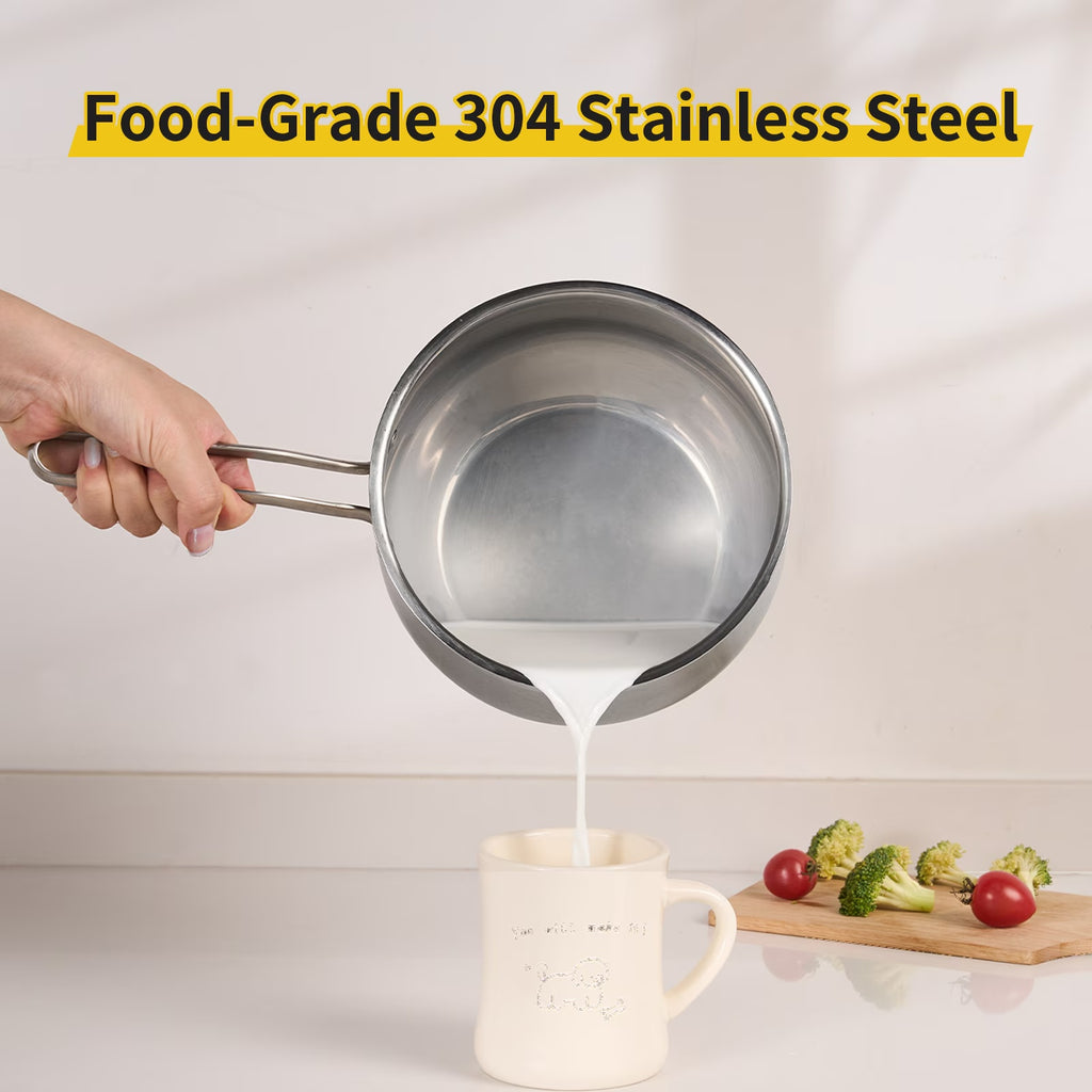 Hand pouring milk from non-stick stainless steel saucepan into white mug in kitchen