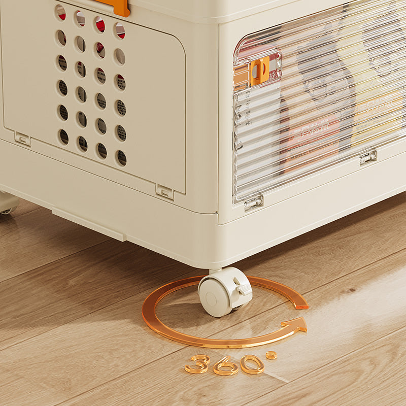 Children's folding storage cabinet with 360 degree rotating caster wheels on wooden floor