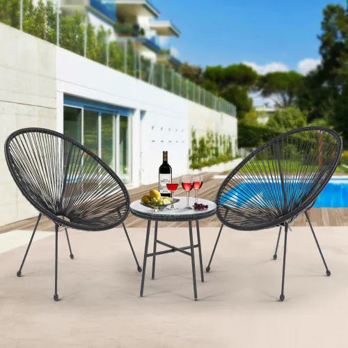 Shopi Vella terrace bistro outdoor bistro conversation set with two black chairs and a round table near pool