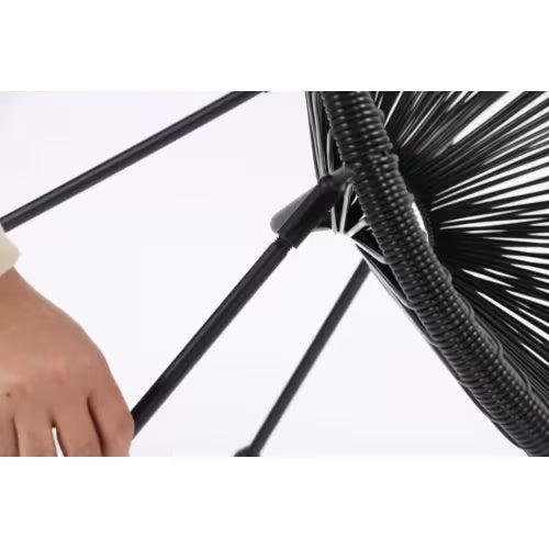 Close-up of black metal frame and woven design from Shopi Vella outdoor bistro conversation set