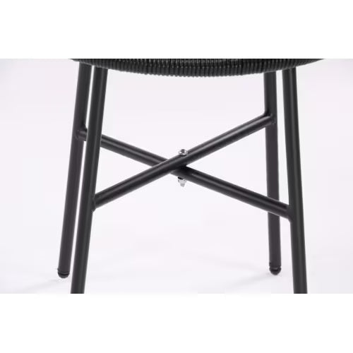 Close-up view of metal frame legs and crossbars for outdoor bistro conversation set chair