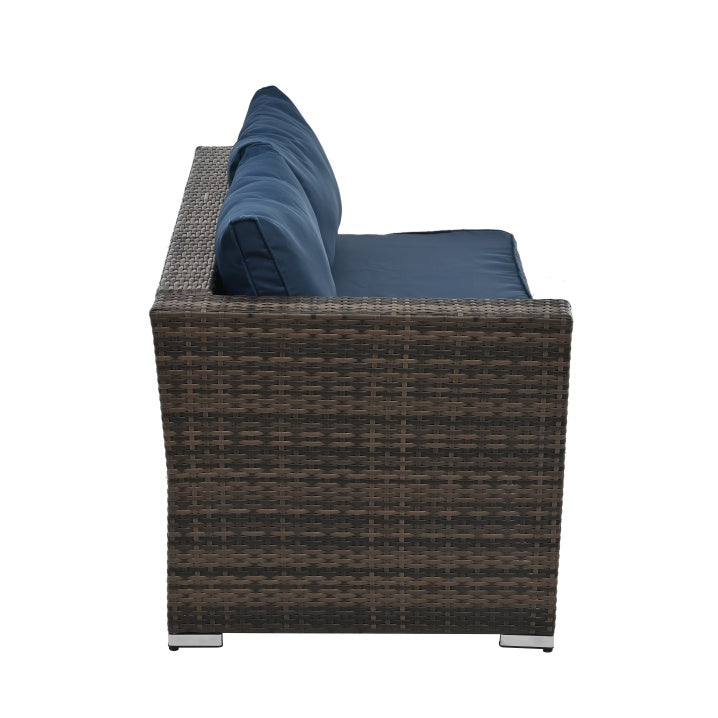 Shopi Vella outdoor wicker furniture with glass table featuring dark wicker and navy blue cushions side view