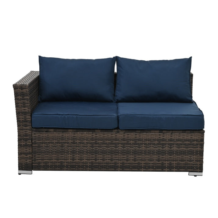Shopi Vella outdoor wicker furniture with glass table featuring dark brown wicker and navy blue cushions