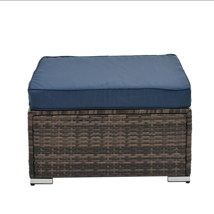 Shopi Vella outdoor wicker furniture with glass table brown woven ottoman with blue cushion