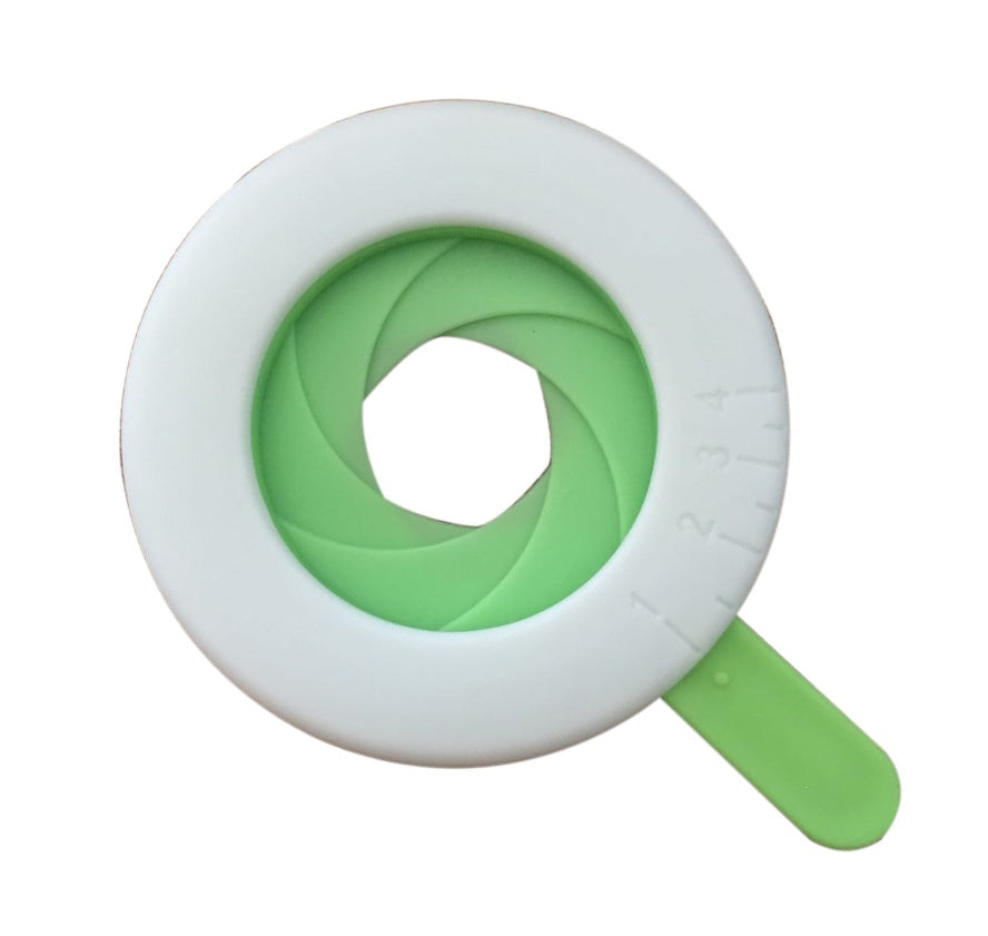 Shopi Vella green and white pasta portion control tool with adjustable measurements for kitchen storage