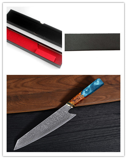 Shopi Vella pattern kitchen knife with blue wooden handle and textured blade on wooden and black surface