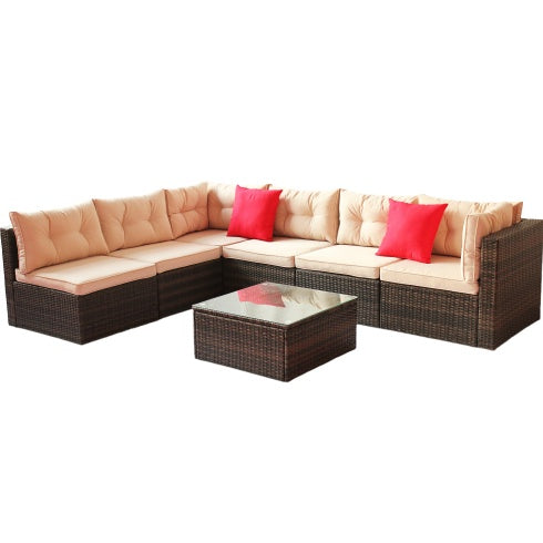 Shopi Vella PE rattan garden corner furniture set with beige cushions and red throw pillows