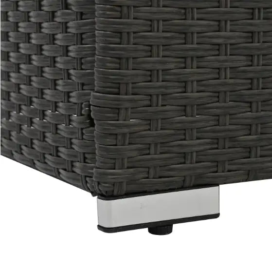 Close-up of dark gray woven PE rattan patio furniture corner with metal leg base