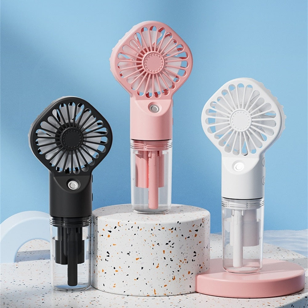 Shopi Vella personal desk fan with water mist in black white and pink colors on display