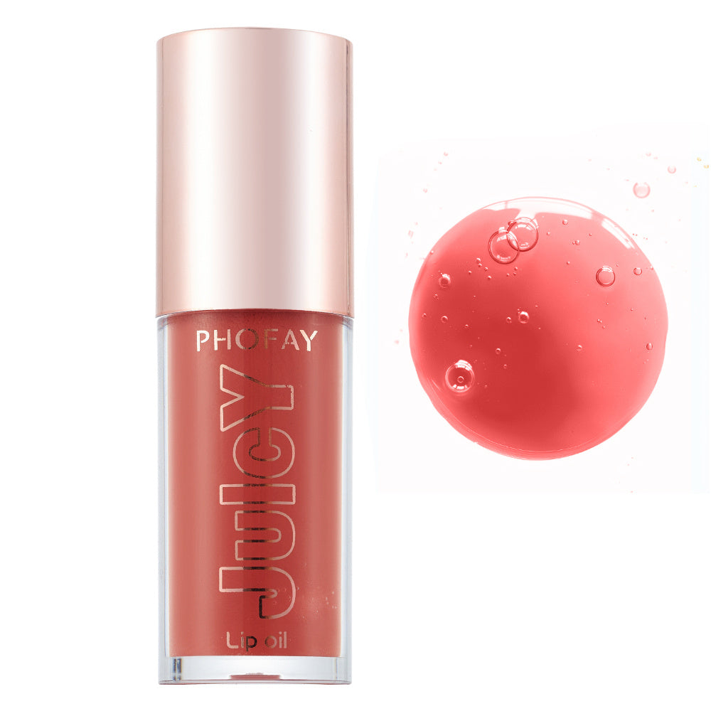 PHOFAY Juicy Lip Oil in coral shade with clear bottle and rose gold cap showing smooth lip oil texture