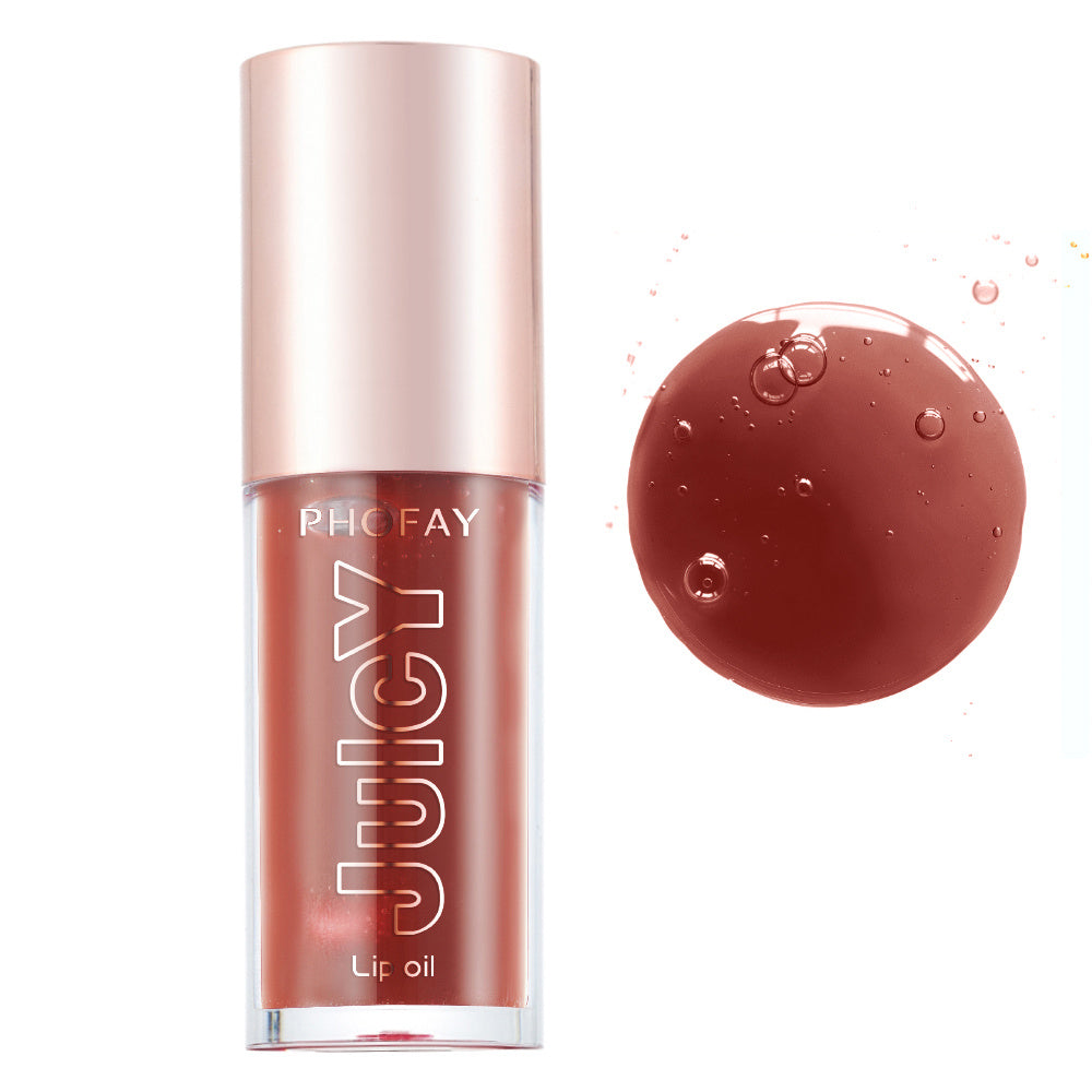 PHOFAY Juicy Lip Oil in rose gold bottle with glossy lip oil swatch beside it