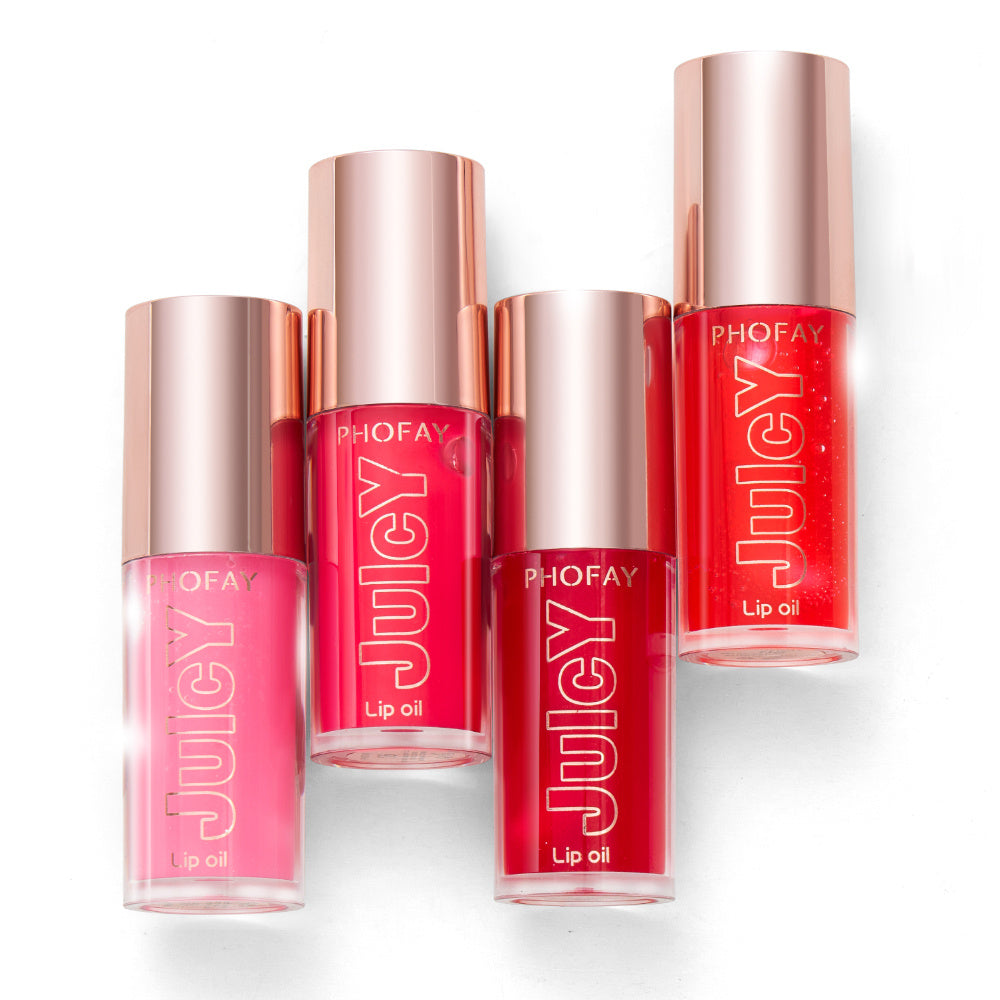 PHOFAY Juicy Lip Oil set with four vibrant shades in clear bottles and rose gold caps