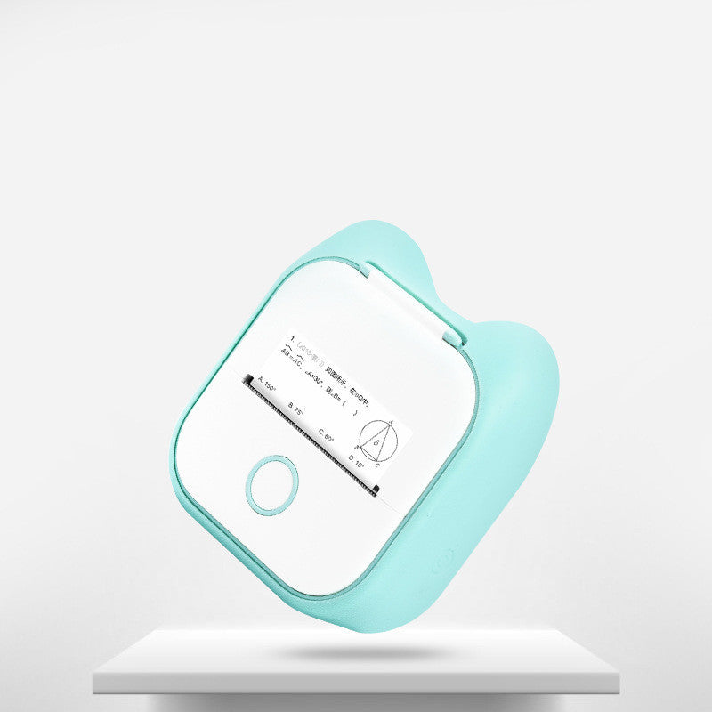 Shopi Vella portable mini thermal label printer in blue printing a math diagram on white paper