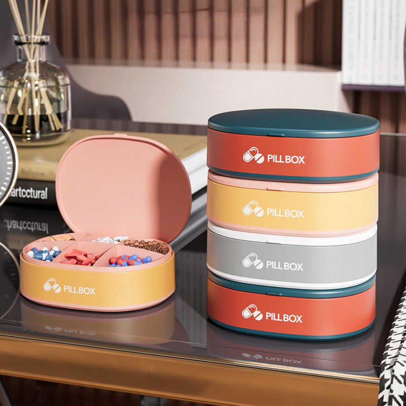 Shopi Vella portable weekly pill organizer with multiple compartments in colorful stackable design