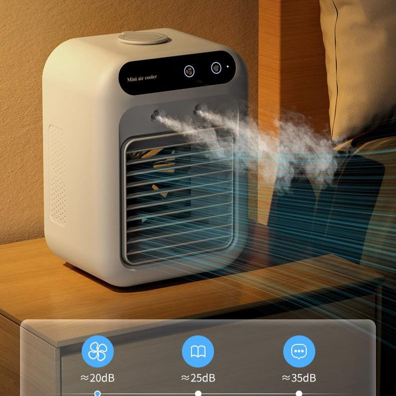 Shopi Vella portable air cooler for room on wooden nightstand emitting cool mist near a bed