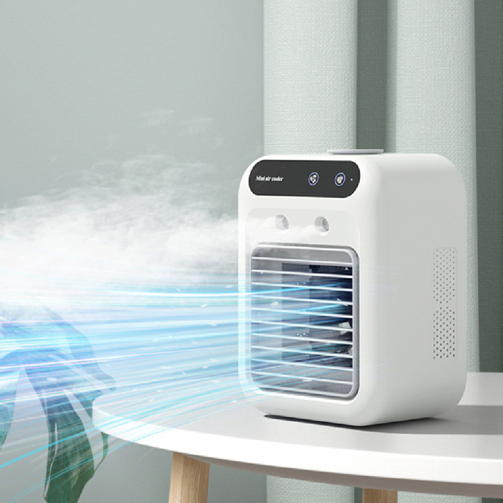 Shopi Vella portable air cooler for room in white on a table with blue airflow and mist