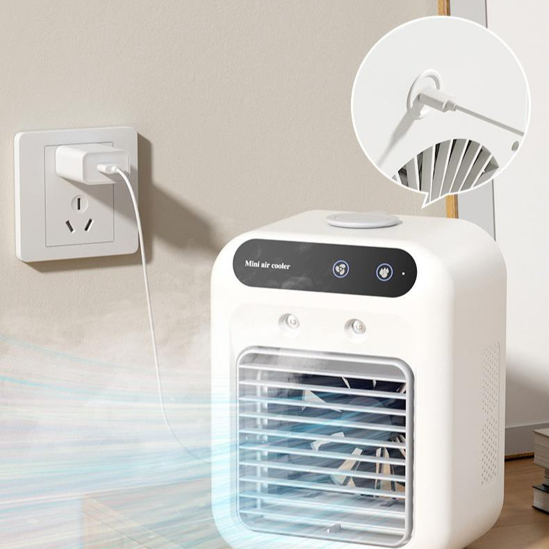 Shopi Vella portable air cooler for room in white with USB power connected to wall outlet