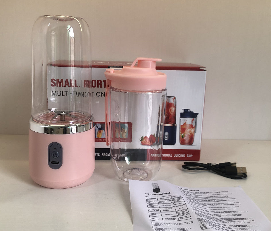 Shopi Vella portable blender for smoothies in pink with two blending cups and USB charging cable