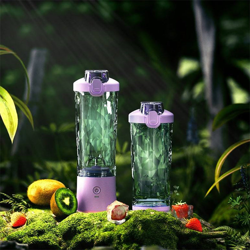 Shopi Vella portable blender for smoothies with two purple-blended containers surrounded by fresh fruits