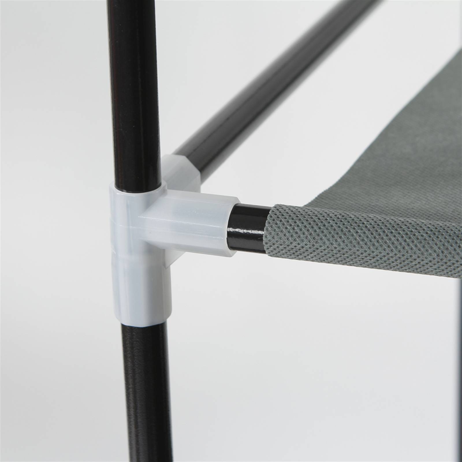Close-up of black frame and fabric shelf detail of Shopi Vella portable closet organizer with shelves