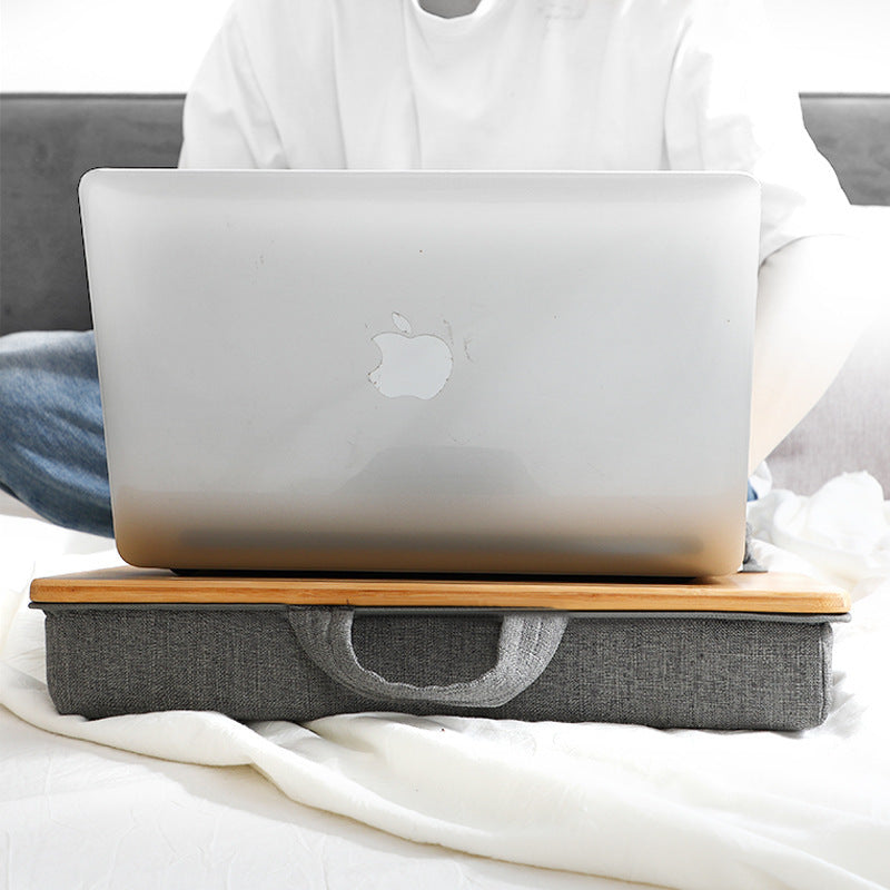 Shopi Vella portable computer desk for home with wooden surface and gray fabric storage cushion