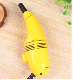 Shopi Vella yellow portable computer keyboard brush designed for easy cleaning