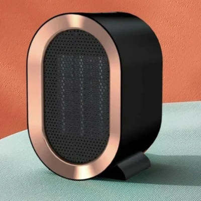 Shopi Vella portable desktop electric heater with black body and copper trim for home storage