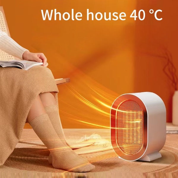 Shopi Vella portable desktop electric heater emitting warm air in a cozy living room setting