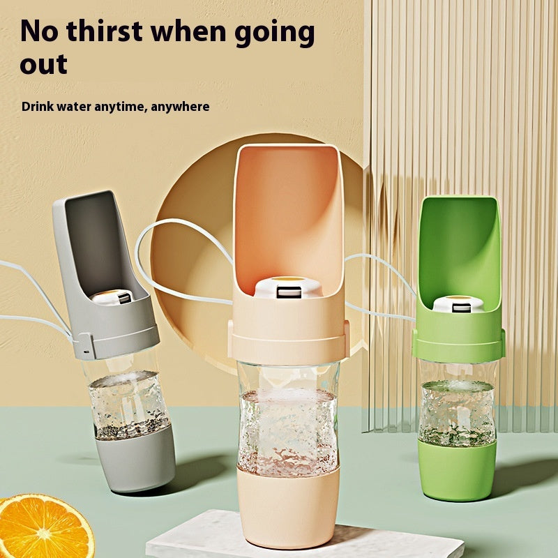 Shopi Vella portable dog water bottle in gray peach and green colors for easy hydration on the go