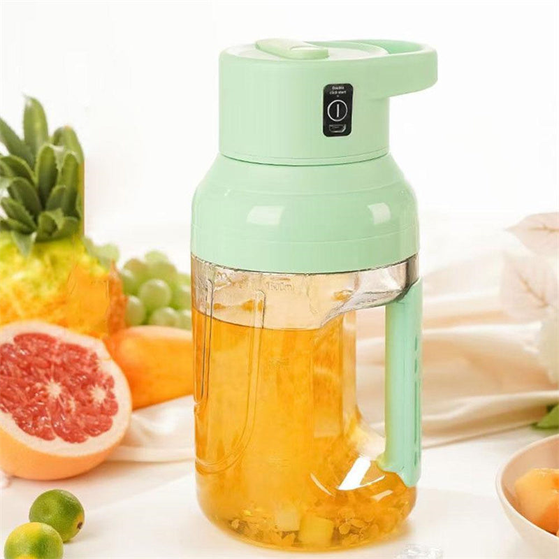 Shopi Vella portable electric juicer blender in mint green with fresh juice and fruits