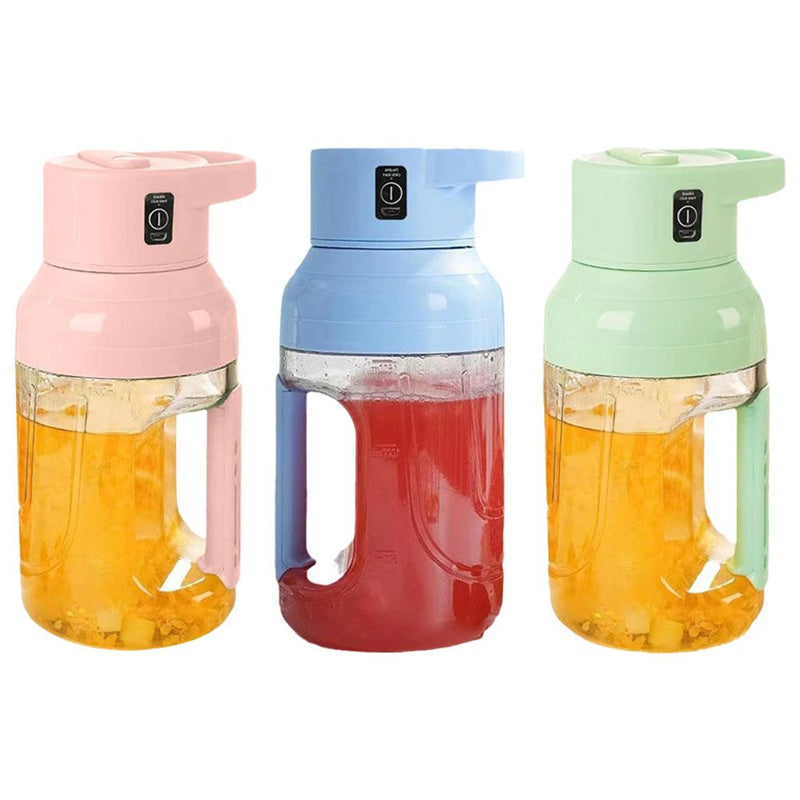 Shopi Vella portable electric juicer blender in pink blue and green with fruit juice inside