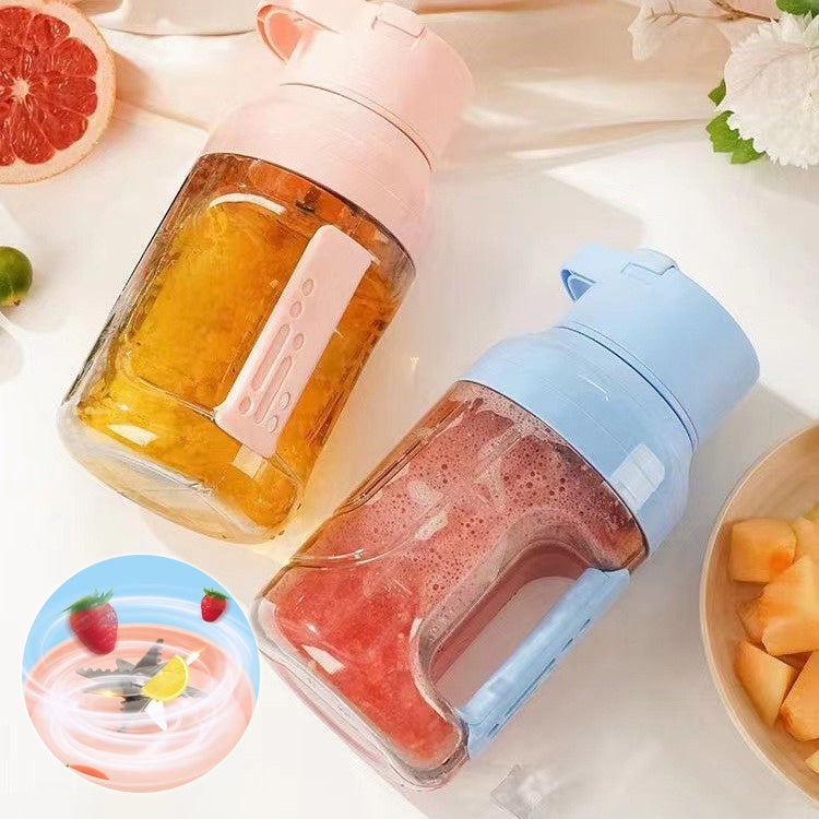 Shopi Vella portable electric juicer blender in pink and blue with fresh fruit smoothies